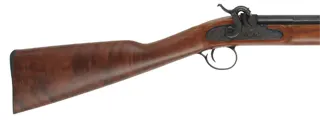 T/C New Englander Rifle,
.50 caliber with QLA, 26" barrel,
percussion, figured walnut, iron trim, 
appears unfired, by Thompson Center Arms